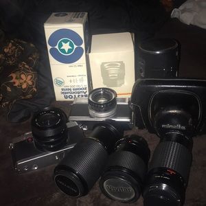 2 cameras , 3 lenses , 2 cases